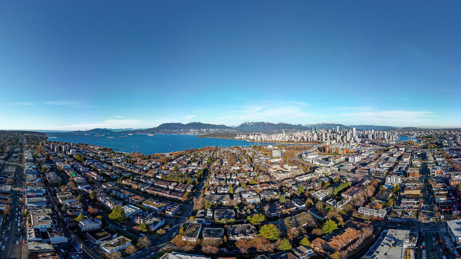 Aerial view of Vancouver panorama, kitsilano beach summer, created by Luska Media for El Baron Barbershop virtual tour.